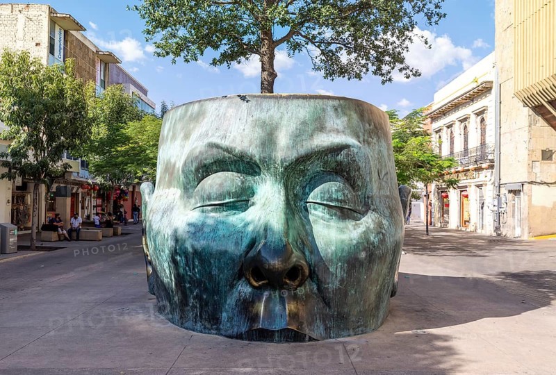 Guadalajara, Jalisco, Mexico, 14 April, 2021: Tourist destination Arbol Adentro face Statue in Guadalajara historic city center favoured by tourists and locals alike, Central America