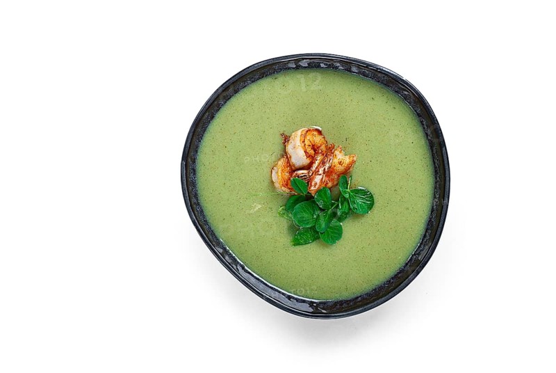 Pea cream soup, with shrimp, green soup, homemade, top view, no people, isolate, on a white background