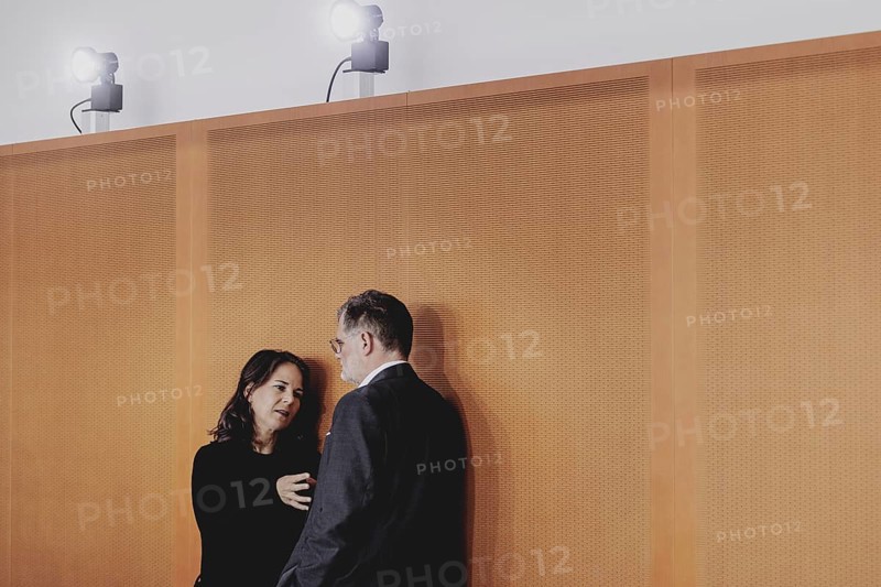 (R-L) Wolfgang Schmidt (SPD), Head of the Federal Chancellery, and Annalena Bärbock (Alliance 90/The Greens), Federal Foreign Minister, pictured during the weekly cabinet meeting in Berlin, 21/08/2024