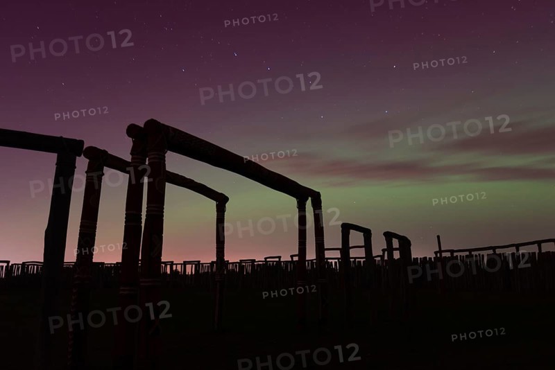Northern lights (aurora borealis) over the ring sanctuary of Pömmelte, prehistoric circular ditch complex, also known by archaeologists as the German Stonehenge, Pömmelte, Saxony-Anhalt, Germany, Europe