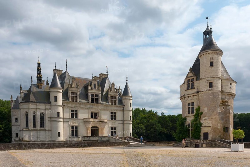 Castle with large tower on gravel square and cloudy sky in the background, Chenonceau Castle, Château de Chenonceau, moated castle, Cher River, Marques Tower on the right, Chenonceaux, Indre-et-Loire, Centre-Val de Loire, France, Europe