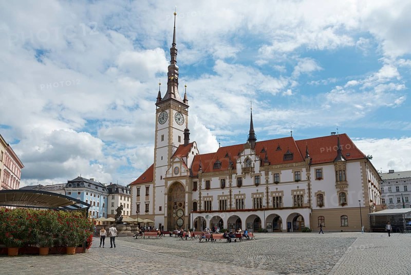 View of a historic town hall with clock tower on a cloudy day on an empty square, Town Hall, Olomouc, Olomoucj, Olomoucký kraj, Moravia, Czech Republic, Europe