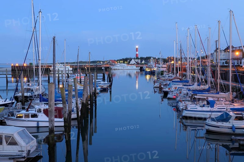 Harbor with sailing boats and lighthouse at dusk, Sylt, North Frisian Islands, Hörnum, North Sea, Schleswig Holstein, Germany, Europe