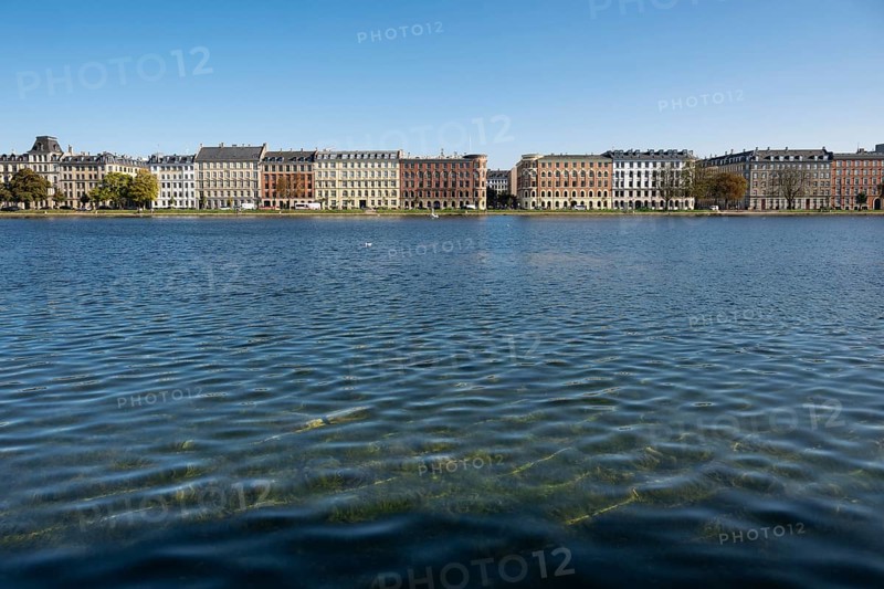 Historic buildings on the waterfront under a blue sky, Søerne, Sortedams Sø, Copenhagen Lakes, Copenhagen, Denmark, Europe