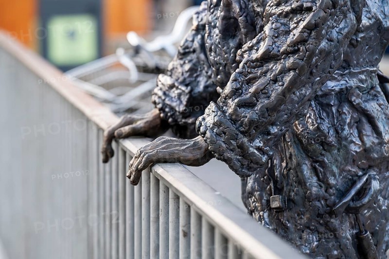 Detail hands, B&W worker, sculpture by Jens Galschiøt, Børnehusbroen, Christianshavns Kanal, Copenhagen, Denmark, Europe