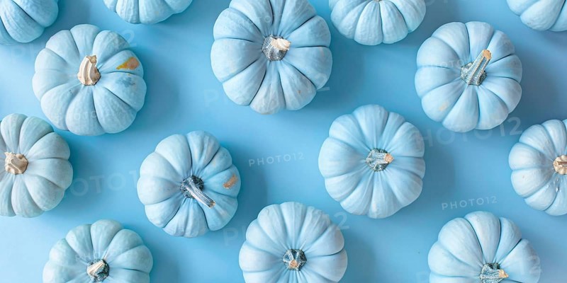 Banner with small pastel blue decorative pumpkins on blue background. Generative Ai, AI generated