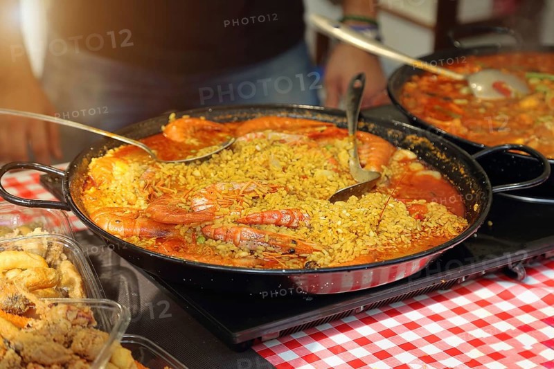 Paella preparation, street market stand near Barcelona Cathedral square