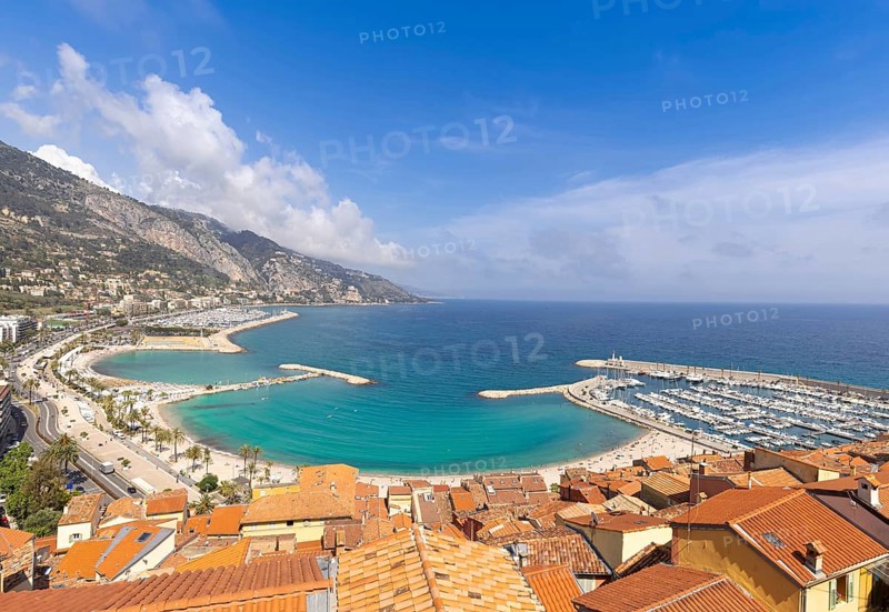 Scenic panoramic view of Menton seashore promenade and historic city in French Riviera Cote D azur