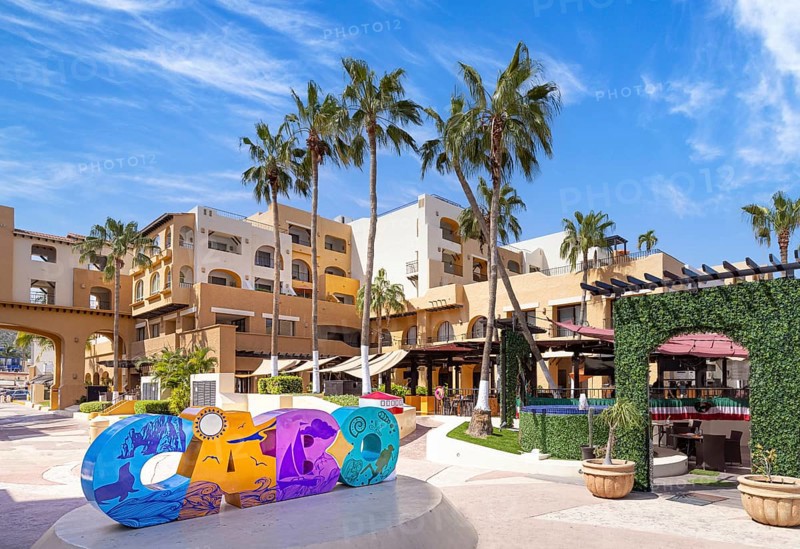 Cabo San Lucas, Los Cabos, Mexico, 2 October, 2021: Los Cabos colorful letters in Cabo San Lucas marina a departure point for cruises, marlin fishing and lancha boats to El Arco Arch and beaches, Central America