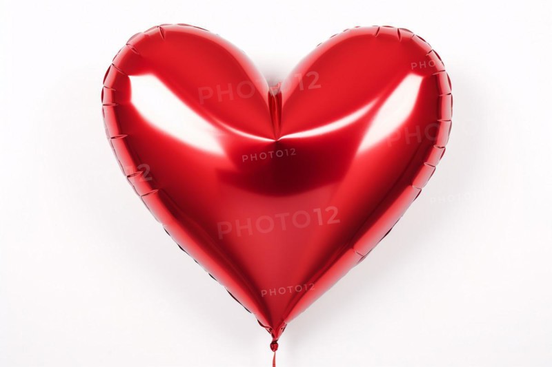 Red heart shaped foil balloon on white background. KI generiert, generiert, AI generated