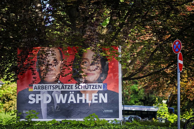 An SPD election poster for the European elections with Federal Chancellor Olaf Scholz and lead candidate Katarina Barley stands under a tree in Berlin Hermsdorf. Berlin, 08.05.2024