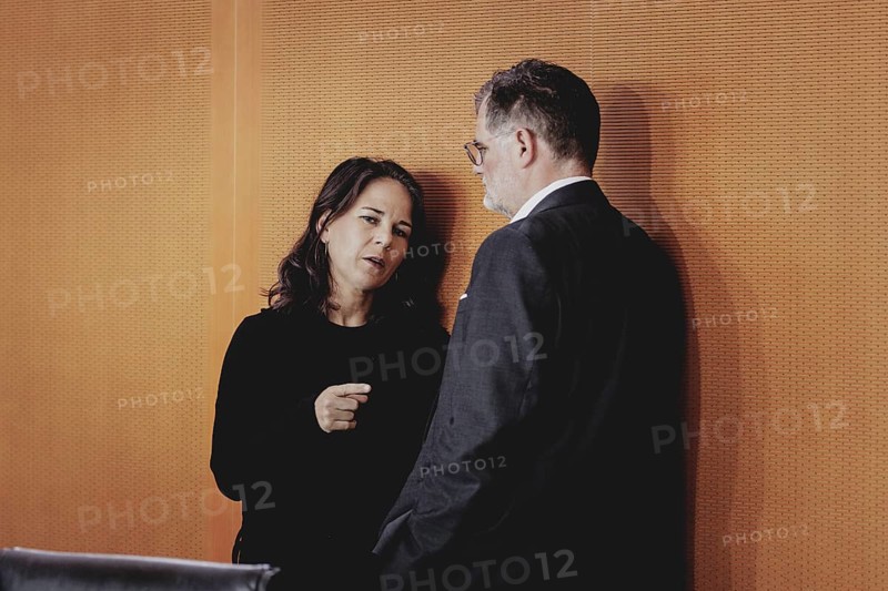 (R-L) Wolfgang Schmidt (SPD), Head of the Federal Chancellery, and Annalena Bärbock (Alliance 90/The Greens), Federal Foreign Minister, pictured during the weekly cabinet meeting in Berlin, 21/08/2024