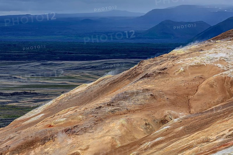 Geothermal field and sulphur springs in front of mountain landscape, clouded, Namafjall, Myvatn, North Iceland, Iceland, Europe