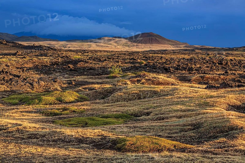 Large lava field and volcanic crater in the midnight sun, clouds, mood, Burfellshraun, Myvatn, North Iceland, Iceland, Europe
