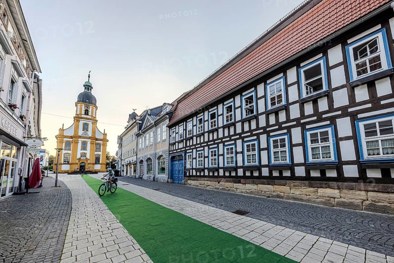 Evangelical Lutheran Kreuzkirche. Rectory of the Kreuzkirche parish in Suhl. Half-timbered building with Thuringian ladder motif, typical gatehouse with passageway. Town view of Suhl, Thuringia, Germany, Europe
