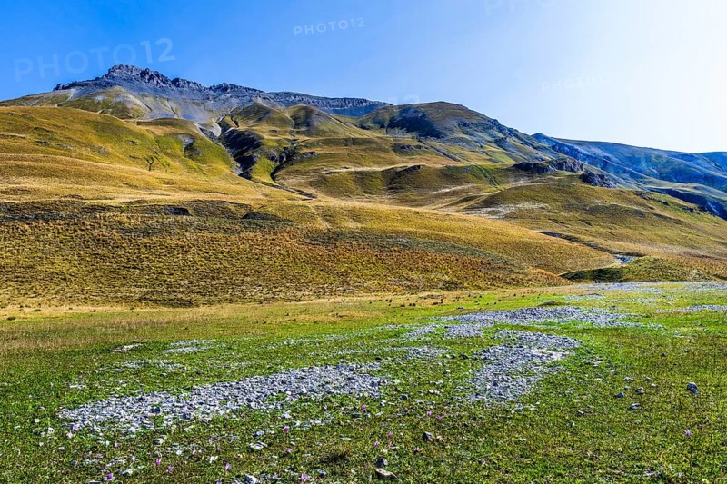 View of road and mountains at border pass Col de Larche (Colle della Maddelena), Provinz Cuneo, Département Alpes-de-Haute-Provence and Italy, France, Alps, Europe