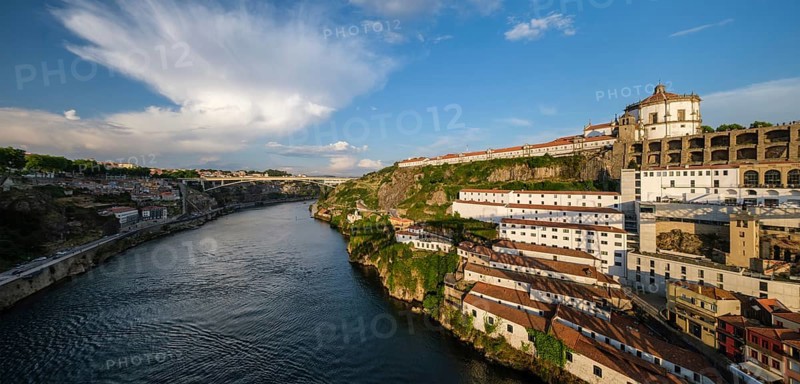 Panorama of Vila Nova de Gaia city with Mosteiro da Serra do Pilar monastery and Douro river on sunset. Porto, Vila Nova de Gaia, Portugal, Europe