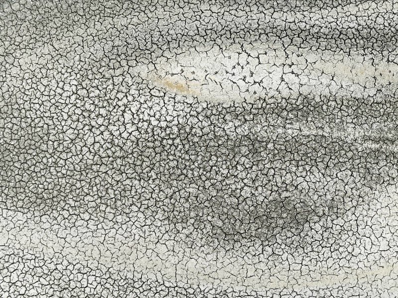 Cracked earth in the marshland near Sanlúcar de Barrameda. Aerial view. Drone shot. Cádiz province, Andalusia, Spain, Europe