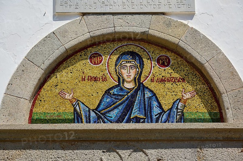 Cross-domed church of Diasososuan, close-up of a mosaic depicting Mary with outstretched arms, set in a semicircular stone portal, Chora, Old Town, Patmos, Dodecanese, Greek Islands, Greece, Europe