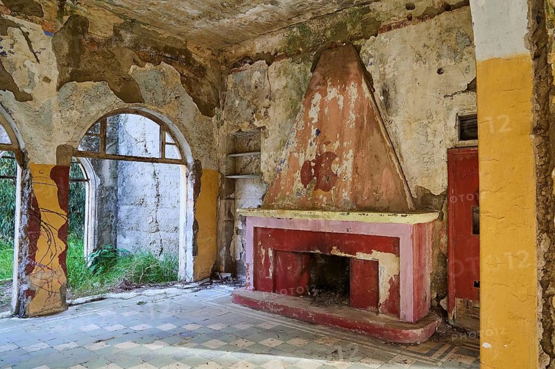 An abandoned historic building with colourful dilapidated walls and a dilapidated fireplace inside, Italian Governor's Palace, Ruins, Italian colonial settlement, Eleousa, Rhodes, Dodecanese, Greek Islands, Greece, Europe