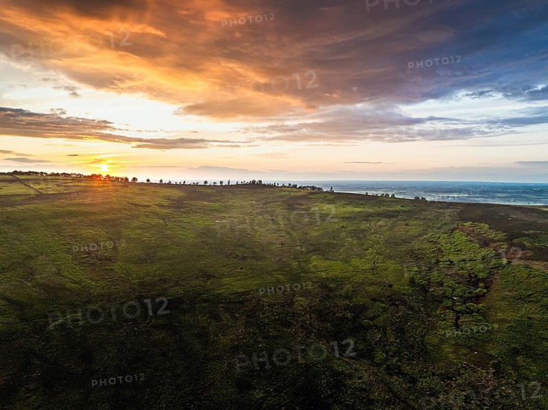 Sunset over Cod Beck Reservoir from a drone, North York Moors National Park, North Yorkshire, England, United Kingdom, Europe