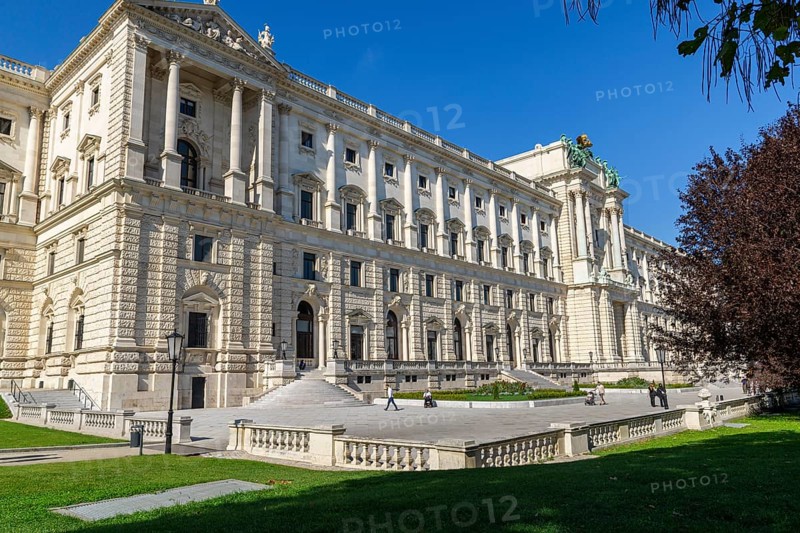 The Hofburg Imperial Palace Palace in Vienna, impressive architecture with green space and clear sky, Vienna, Austria, Europe