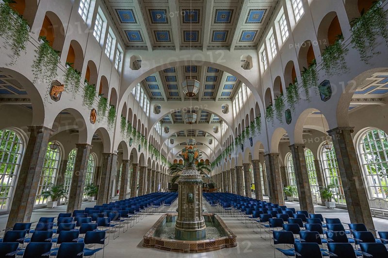 Promenade hall with fountain house with decorative Art Nouveau ceramic fountain made of majolica tiles, Kissingen spa, inaugurated in 1842, replaced by a new building in 1911, Bad Kissingen, Lower Franconia, Bavaria, Germany, Europe