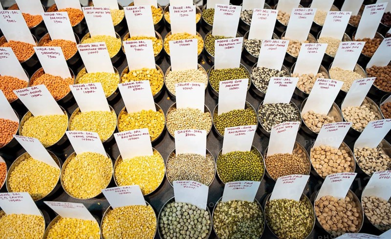 Samples of pulses kept on display inside a shop at a wholesale market ahead of the presentation of the Interim Budget 2024 by Union Finance Minister Nirmala Sitharaman, in Guwahati, Assam, India on Thursday, Feb. 1, 2024