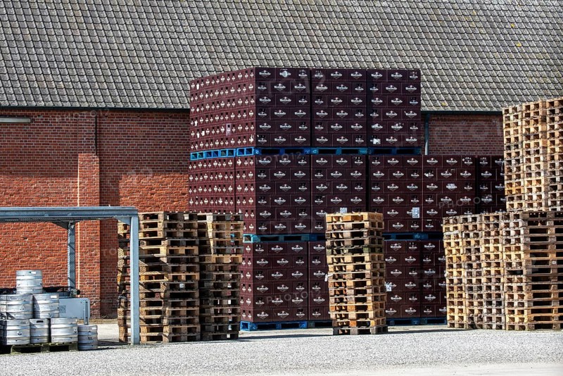 Stacked beer crates at trappist Abbey of Westmalle, Flemish monastery of Cistercians and brewery in Westmalle, province of Antwerp, Flanders, Belgium, AI generated, Europe