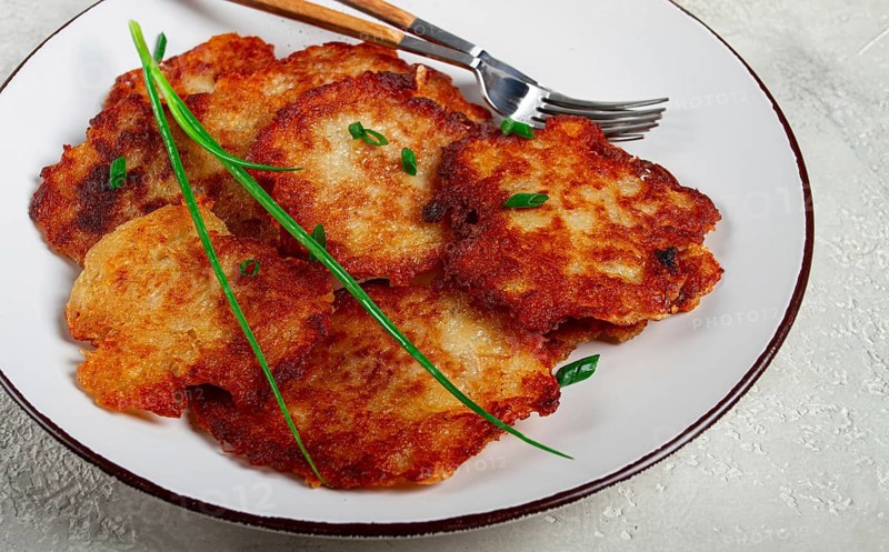 Potato pancakes, pancakes with sour cream, Belarusian dish, homemade, no people