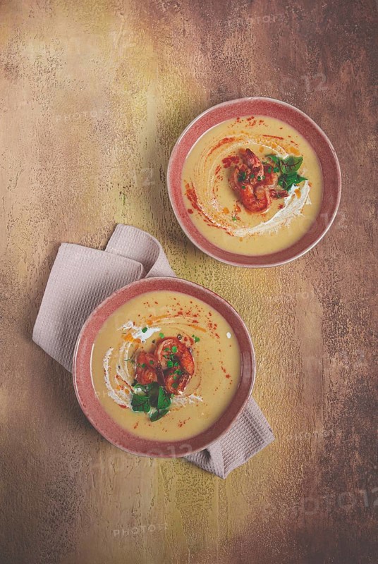 Pumpkin cream soup with shrimp, herbs and spices, homemade, no people