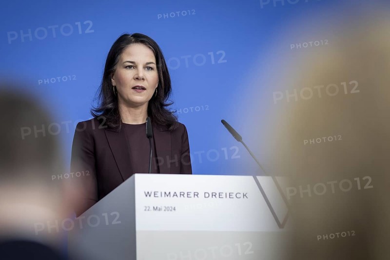 Annalena Bärbock (Alliance 90/The Greens), Federal Minister for Foreign Affairs, Stephane Sejourne (not pictured), Minister for Europe and Foreign Affairs of the French Republic, and Radoslaw Sikorski (not pictured), Minister for Foreign Affairs of the Republic of Poland, photographed during a joint meeting with the press in Weimar, 22 May 2024. Photographed on behalf of the Federal Foreign Office