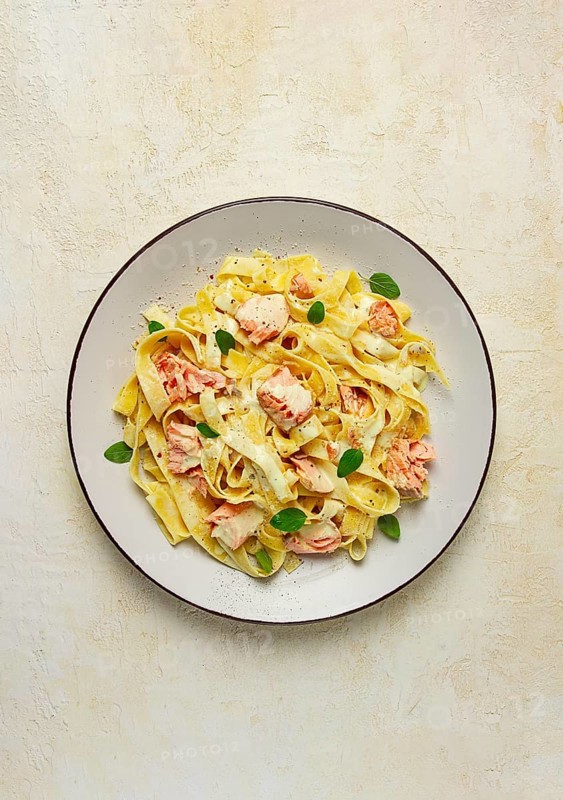 Tagliatelle pasta, in cream sauce with salmon, homemade, no people