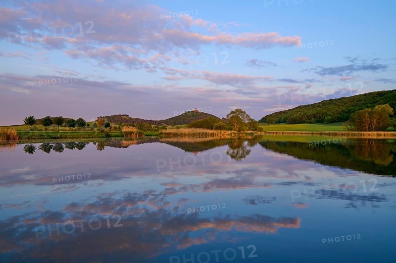 Lake with reflection in spring with castle at sunset, Veste Wachsenburg, Amt Wachsenburg, Drei Gleichen, Ilm-Kreis, Thuringia, Germany, Europe