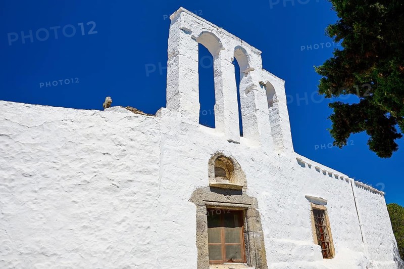White church with a three-arched bell tower against a clear blue sky, Greek architecture, Chora, Old Town, Patmos, Dodecanese, Greek Islands, Greece, Europe