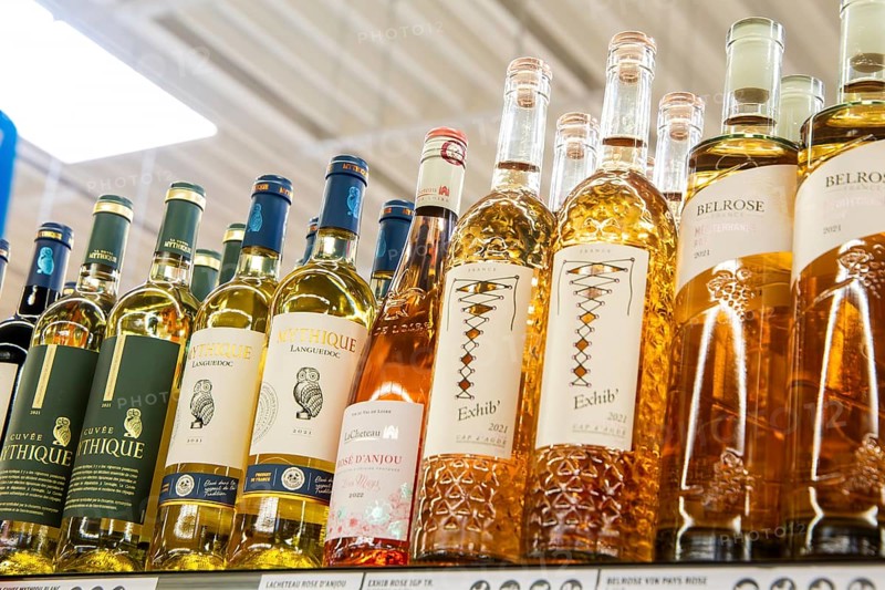 February 2024: Wine shelf with wine from France in the supermarket