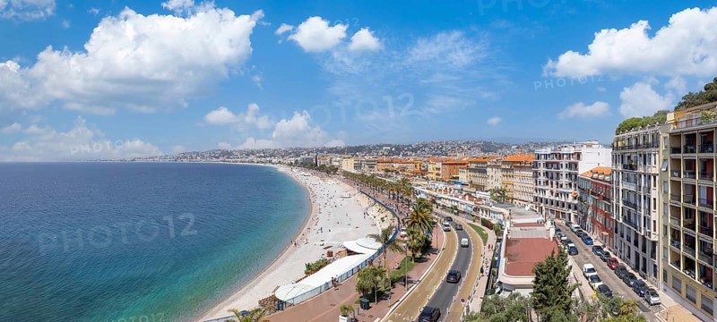 France, panoramic skyline of old historic Nice center and azure beaches along Promenade des Anglais, Europe