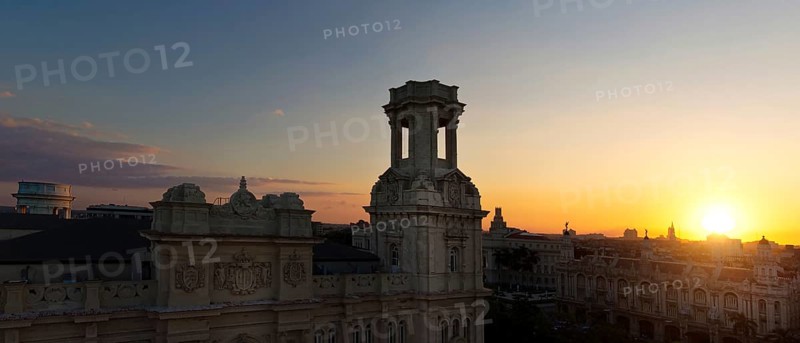 Authentic Old Havana (Havana Vieja) buildings at sunset in historic city center near Central Park and El Capitolio