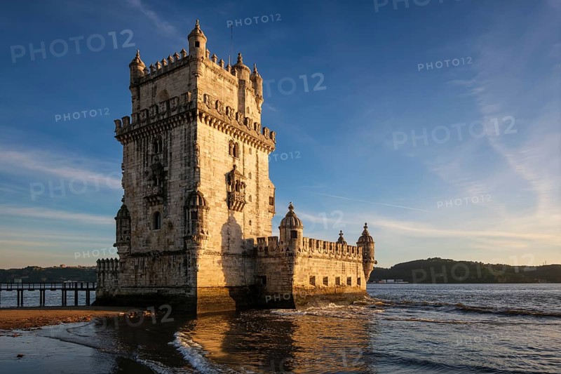Belem Tower or Tower of St Vincent, famous tourist landmark of Lisboa and tourism attraction, on the bank of the Tagus River Tejo on sunset. Lisbon, Portugal, Europe