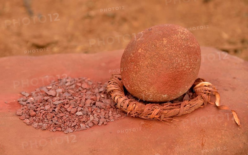 Grinding tool and red iron rocks ??used for the traditional skin cream of the Himba, Omuramba, Kaokoland, Kunene, Namibia, Africa