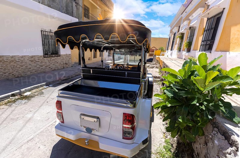 Famous pulmonia taxi waiting on the streets of Mazatlan Old City to bring visitors to tourist attractions along El Malecon promenade and hotels zone