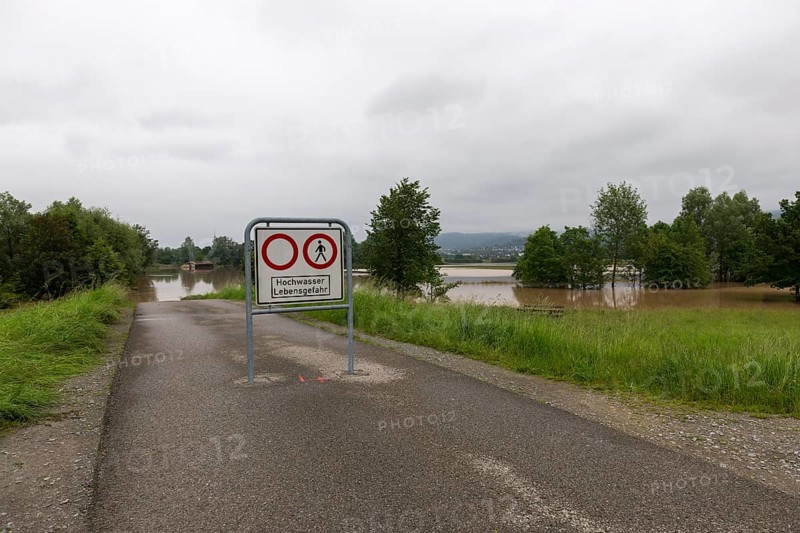 Symbolic image extreme weather, global warming, climate change, information board, flood retention basin, flood protection, danger to life, flooded meadows, deciduous trees, Rems valley, Winterbach, Rems river, Baden-Württemberg, Germany, Europe