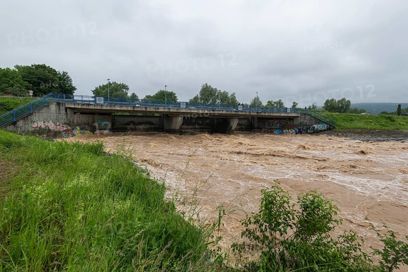 Symbolic image extreme weather, global warming, climate change, barrier, flood protection, bridge, Rems valley, Winterbach, river Rems, Baden-Württemberg, Germany, Europe