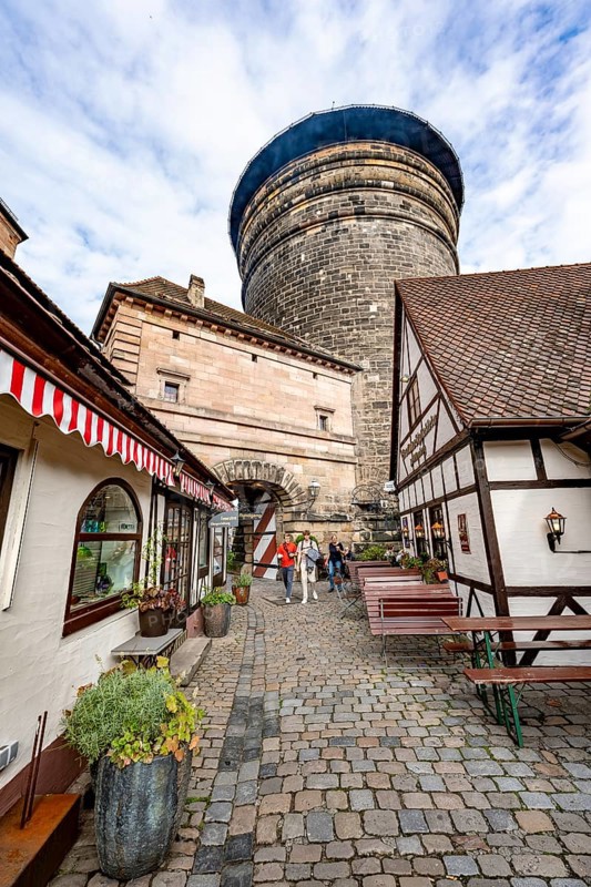 Alley with small shops in the Handwerkerhof, behind Frauentorturm, Nuremberg, Middle Franconia, Bavaria, Germany, Europe