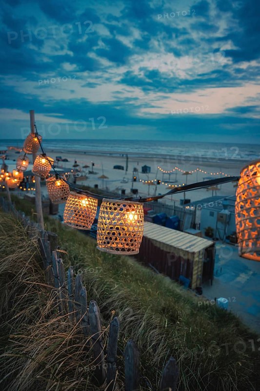 String of lights on the beach at blue hour, Zandvoort, Netherlands