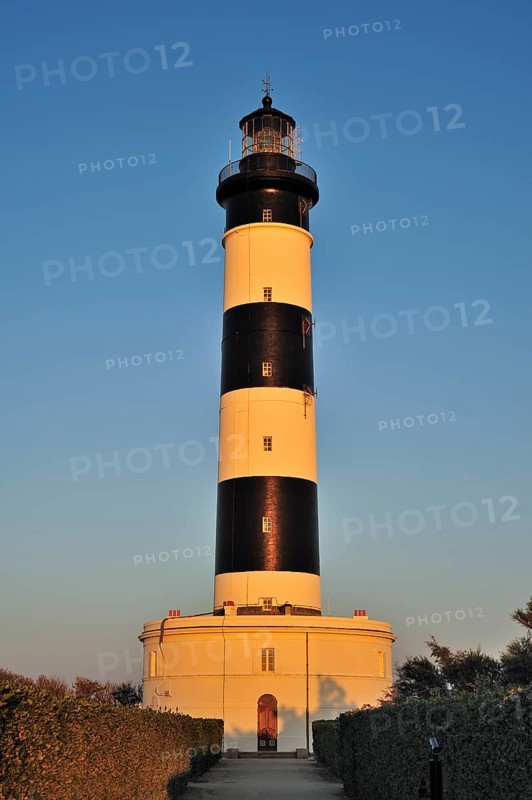 The phare de Chassiron lighthouse at sunset, Saint-Denis-d'Oléron on the island of Ile d'Oléron, Charente-Maritime, France, Europe