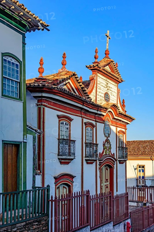 Baroque church facade and colonial houses in the city of Diamantina in Minas Gerais, Brasil