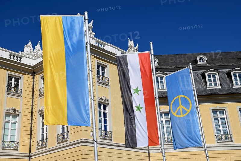 Flags of Ukraine and Syria in front of the Badisches Landesmuseum in Karlsruhe Castle, Karlsruhe, Baden-Württemberg, Germany, Europe