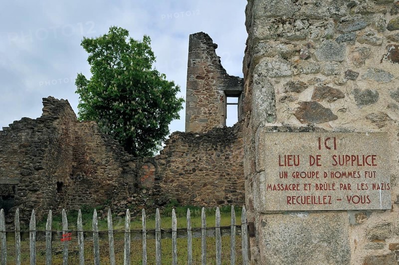 Memorial plaque on the destroyed house. The burnt village of Oradour-sur-Glane was destroyed on 10 June 1944 when 642 of its inhabitants, including woman and children, were massacred by a German Waffen SS company, Limousin, France, Europe