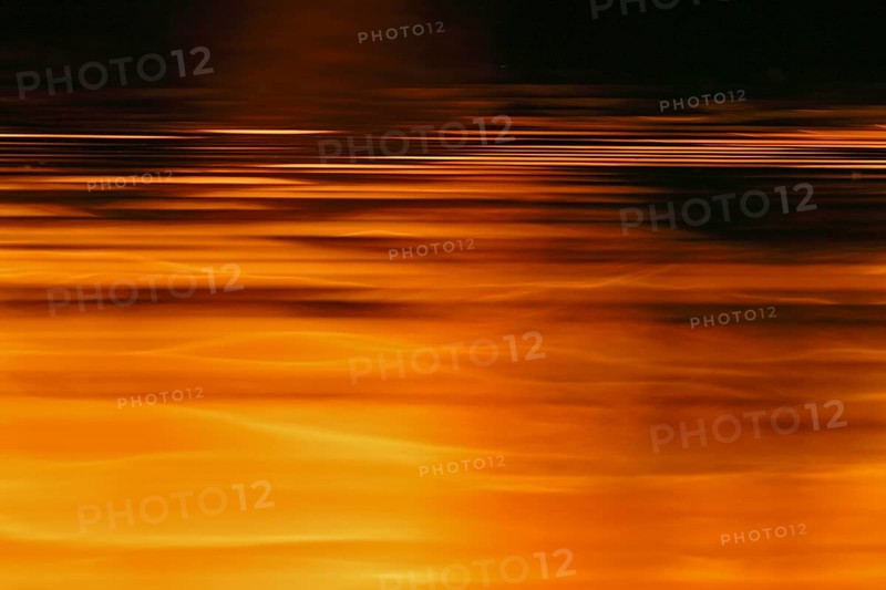 The sun's play of light in the water at sunset on the Trebel River, Peene Valley River Landscape nature park Park, Mecklenburg-Western Pomerania, Germany, Europe